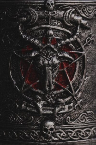 Mysterious occult symbol resembling a Star of David with a goat's head at its centre.