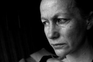Picture of a woman depressed. Internet Addiction by Skendong Poetry