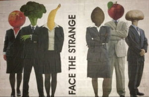 Street Art of five people in smart suits with fruits for their heads. Face the Strange.