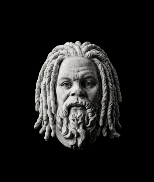A marble bust resembling Socrates with stone dreadlocks and glowing red eyes, centered in a vast black background.