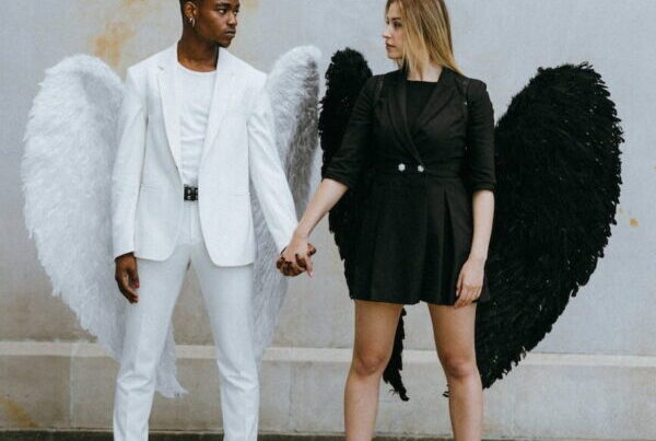 a couple holding each others hands