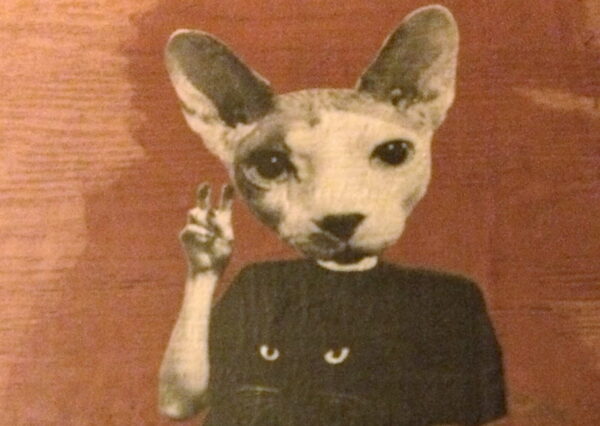 Animal head with human body with a black cat barely visible