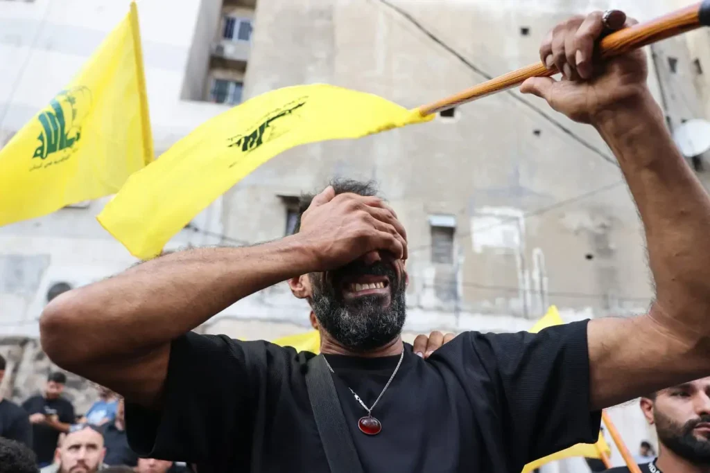 a man crying after lebanon explosions